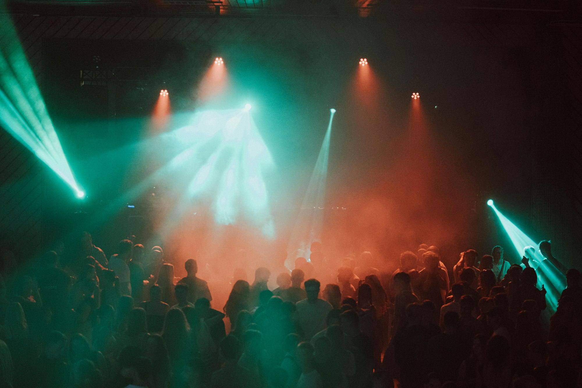 Festival crowd under colorful lights